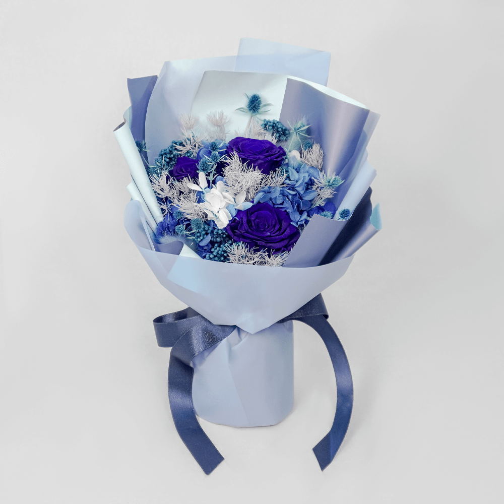 Endless Blue - Preserved Bouquet "Step into a realm of everlasting beauty with Forever Pink, the epitome of timeless grace in preserved bouquets by June Flowers. Our meticulously curated collection of preserved flowers transcends the fleeting nature of fresh blooms, offering a lasting symbol of love, admiration, and appreciation.