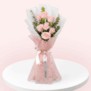 Pink roses and eucalyptus bouquet in Korean floral wrapping sheets