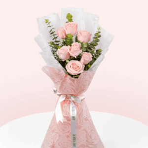 Pink roses and eucalyptus bouquet in Korean floral wrapping sheets
